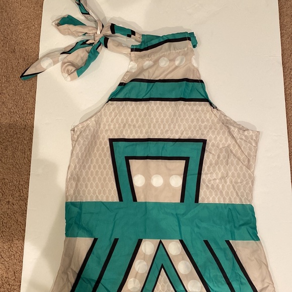 Maxi dress. Ties at the side of the neck.  Material does not have any give. - Picture 2 of 4